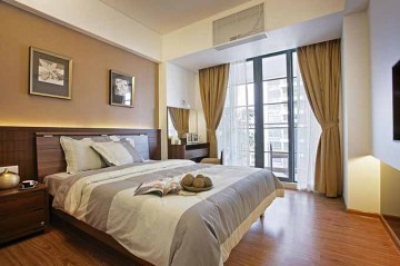 中式端莊雅致110平米三居室臥室吊頂裝修效果圖