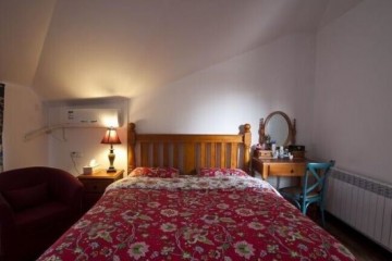 簡潔舒適田園風(fēng)格60平米一居室臥室背景墻裝修效果圖