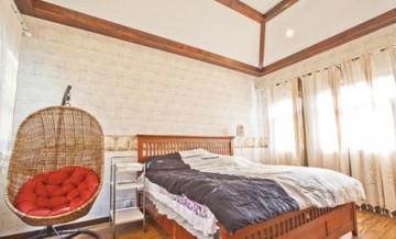 原木精致田園風(fēng)格220平米別墅臥室背景墻裝修效果圖